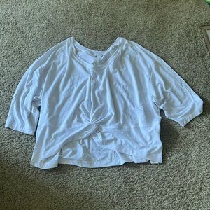 Twist top sleeved active wear shirt.